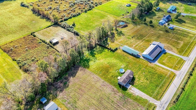 birds eye view of property featuring a rural view