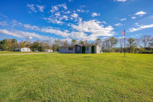 view of yard featuring a garage