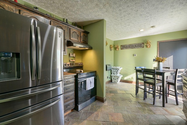 kitchen featuring a textured ceiling, dark brown cabinetry, and stainless steel appliances