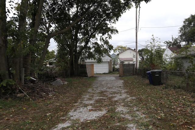 view of yard with a garage