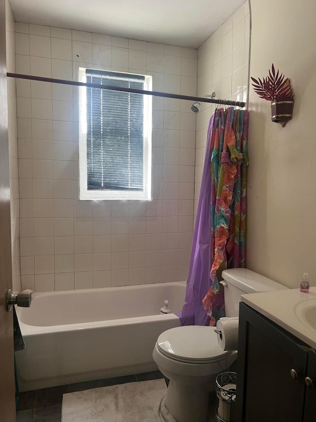 full bathroom featuring shower / bathtub combination with curtain, tile patterned flooring, vanity, and toilet