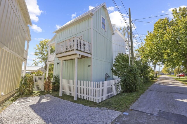 view of home's exterior featuring a balcony