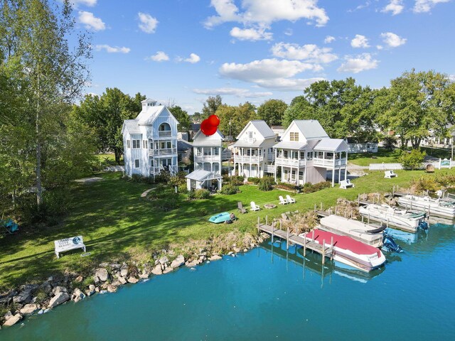 drone / aerial view featuring a water view