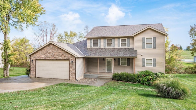 front of property with covered porch, a garage, and a front lawn