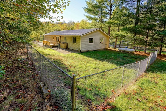 back of property featuring a yard and a patio area