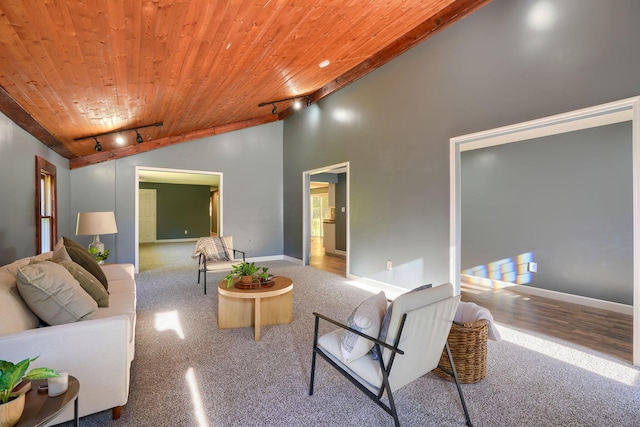 living room with track lighting, high vaulted ceiling, and wooden ceiling