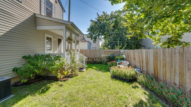 view of yard featuring central AC