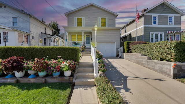 front of property with a garage