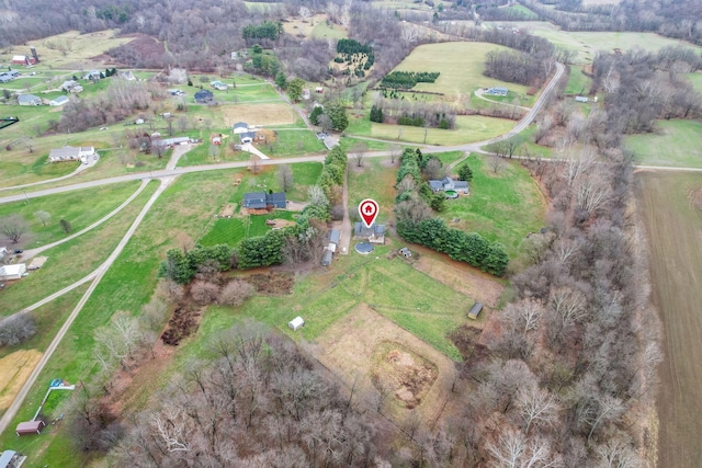 birds eye view of property featuring a rural view