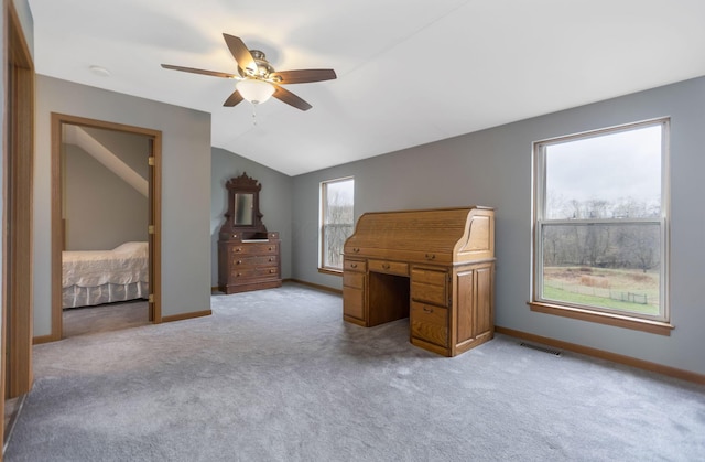 unfurnished bedroom with light carpet, ceiling fan, and lofted ceiling