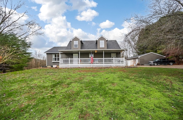 view of front of property with a porch and a front yard