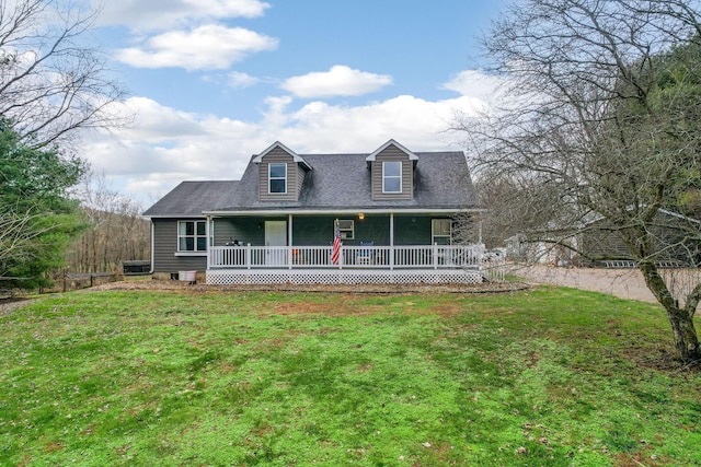 cape cod house featuring covered porch and a front yard