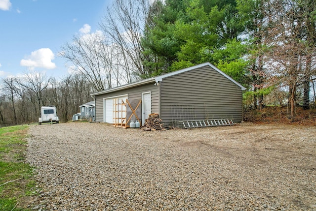 view of outbuilding with a garage