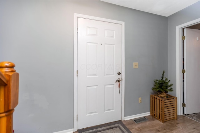 foyer with light hardwood / wood-style floors