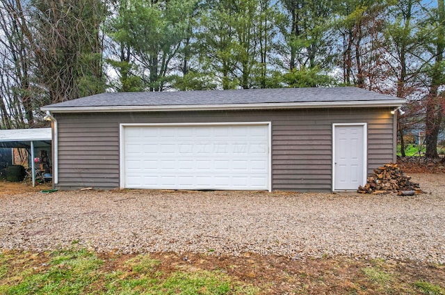 garage with a carport