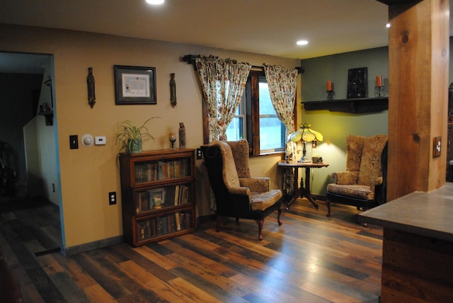 sitting room featuring dark hardwood / wood-style floors