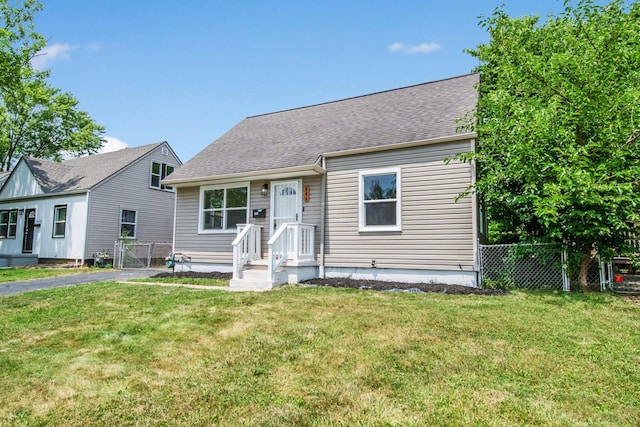 view of front of home featuring a front lawn