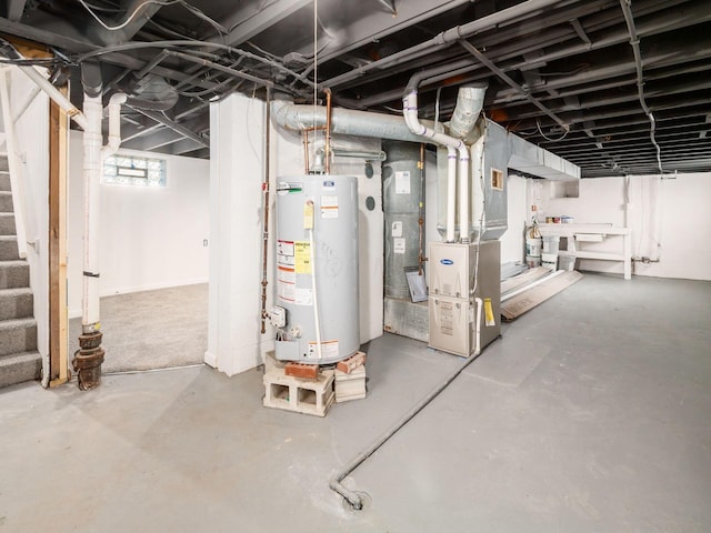 basement with heating unit and gas water heater