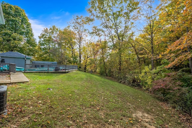 view of yard with a deck