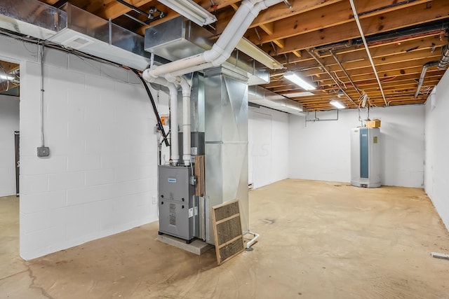 basement featuring gas water heater and heating unit