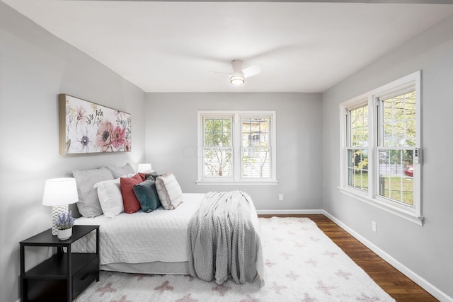 bedroom featuring hardwood / wood-style floors and ceiling fan