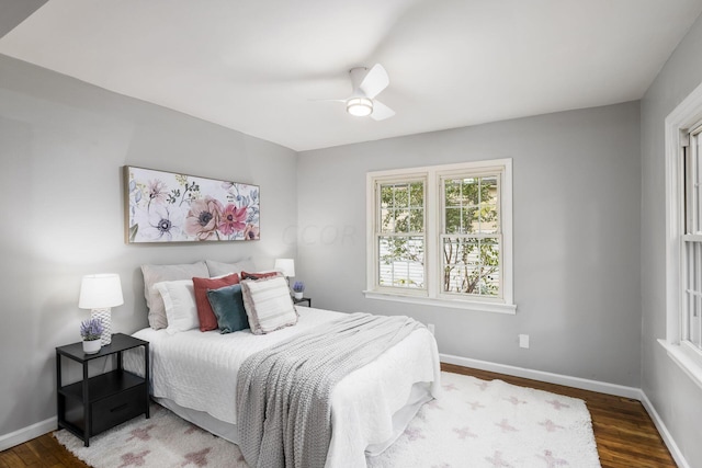 bedroom featuring hardwood / wood-style floors and ceiling fan