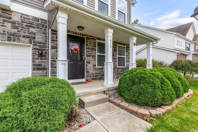 property entrance with covered porch