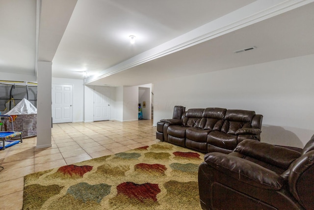 living room with light tile patterned flooring