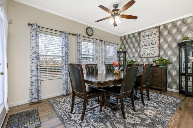 dining area with hardwood / wood-style flooring, ceiling fan, and crown molding