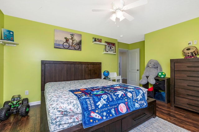 bedroom featuring ceiling fan and dark wood-type flooring