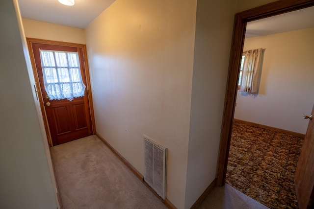 entryway with light carpet