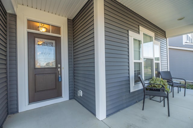 11996 Ficus Field Way, Plain City, OH 43064 - property entrance with a porch