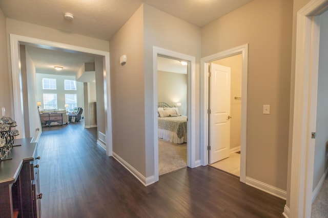 11996 Ficus Field Way, Plain City, OH 43064 - corridor featuring dark wood-style floors and baseboards