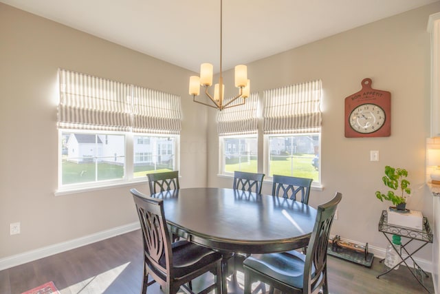 11996 Ficus Field Way, Plain City, OH 43064 - dining room featuring dark wood-style floors and a chandelier