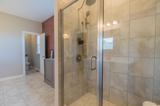 11996 Ficus Field Way, Plain City, OH 43064 - full bathroom featuring a shower stall, vanity, and tile patterned flooring