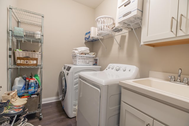 11996 Ficus Field Way, Plain City, OH 43064 - laundry room with cabinet space, washer and dryer, and dark wood-type flooring