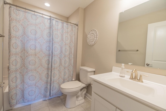 11996 Ficus Field Way, Plain City, OH 43064 - full bathroom featuring tile patterned floors, vanity, and shower / tub combo with curtain