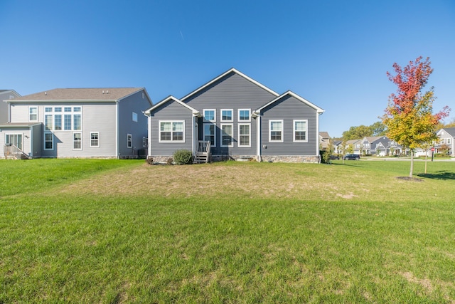 11996 Ficus Field Way, Plain City, OH 43064 - back of house featuring a lawn