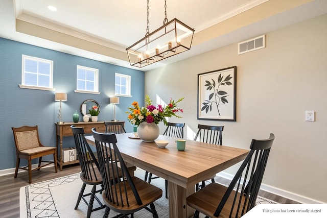 11996 Ficus Field Way, Plain City, OH 43064 - dining space with wood finished floors, recessed lighting, a raised ceiling, and crown molding