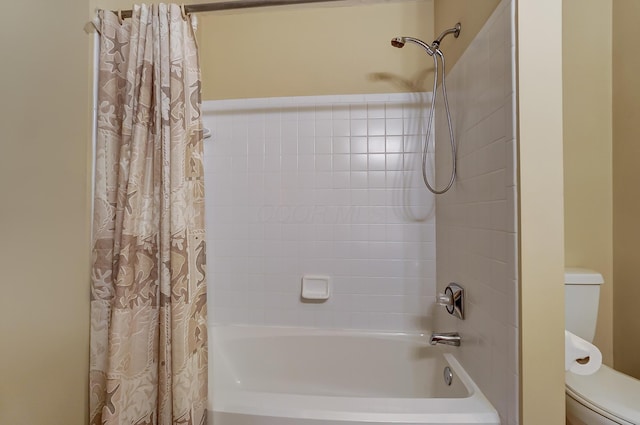 bathroom featuring toilet and shower / bathtub combination with curtain