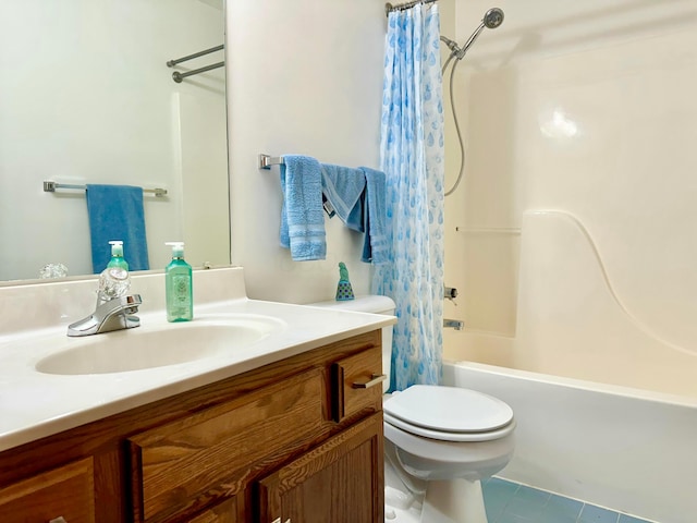 full bathroom featuring tile patterned flooring, shower / bath combo, vanity, and toilet