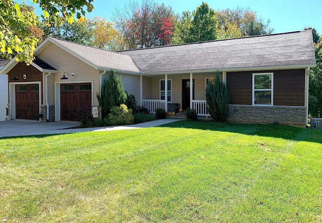 ranch-style home featuring a porch, a garage, and a front lawn