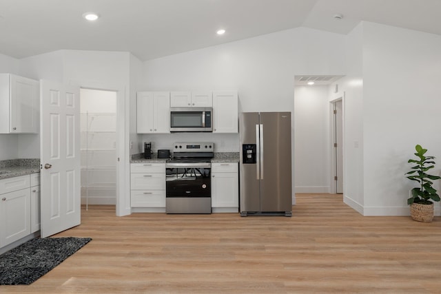 kitchen featuring light wood-type flooring, white cabinetry, and appliances with stainless steel finishes