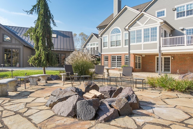 rear view of house featuring a patio area