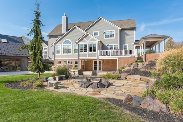 10492 Allen Rd, Pickerington, OH 43147 - rear view of property featuring a patio area, brick siding, a lawn, and a chimney