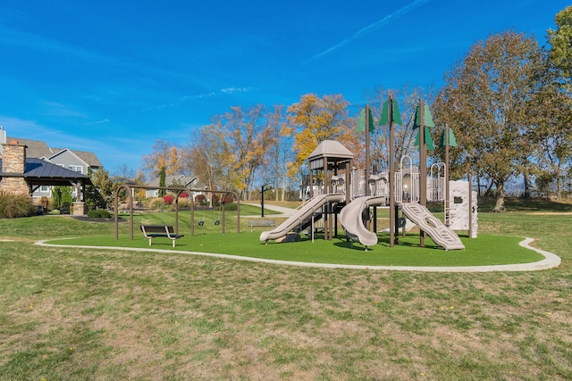 view of playground featuring a lawn