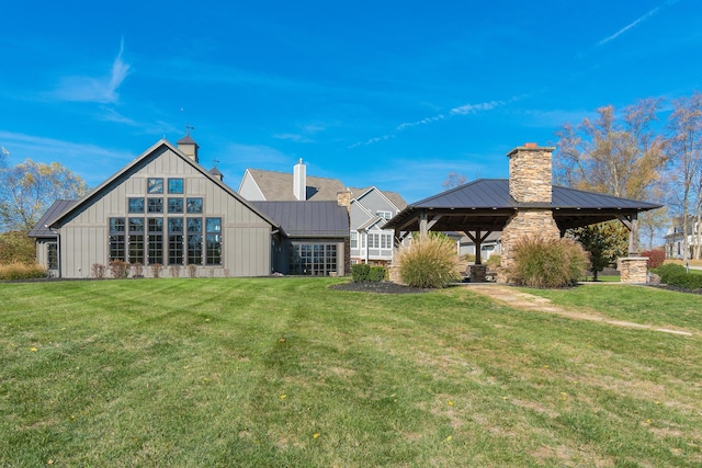 10492 Allen Rd, Pickerington, OH 43147 - back of house with a chimney, a gazebo, a standing seam roof, and a yard