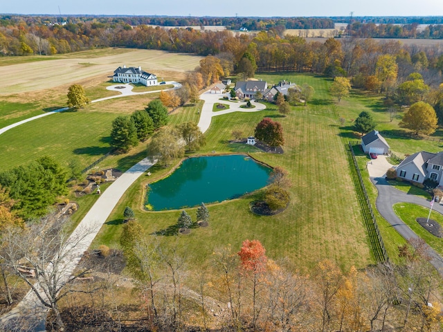 bird's eye view featuring a water view and a rural view