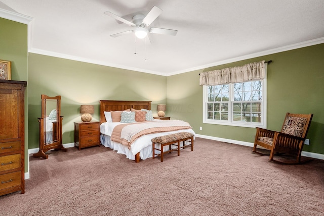 carpeted bedroom with ceiling fan and crown molding