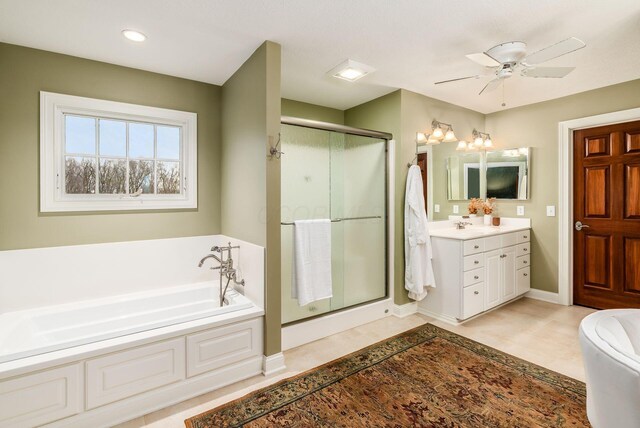 10492 Allen Rd, Pickerington, OH 43147 - full bathroom with vanity, a shower stall, a bath, ceiling fan, and recessed lighting